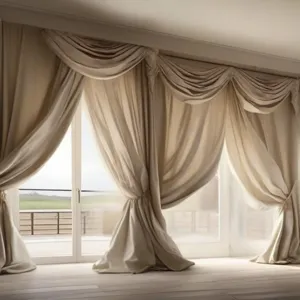 wind blowing the curtains of a house 