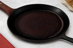 How to properly season and maintain a cast iron skillet?